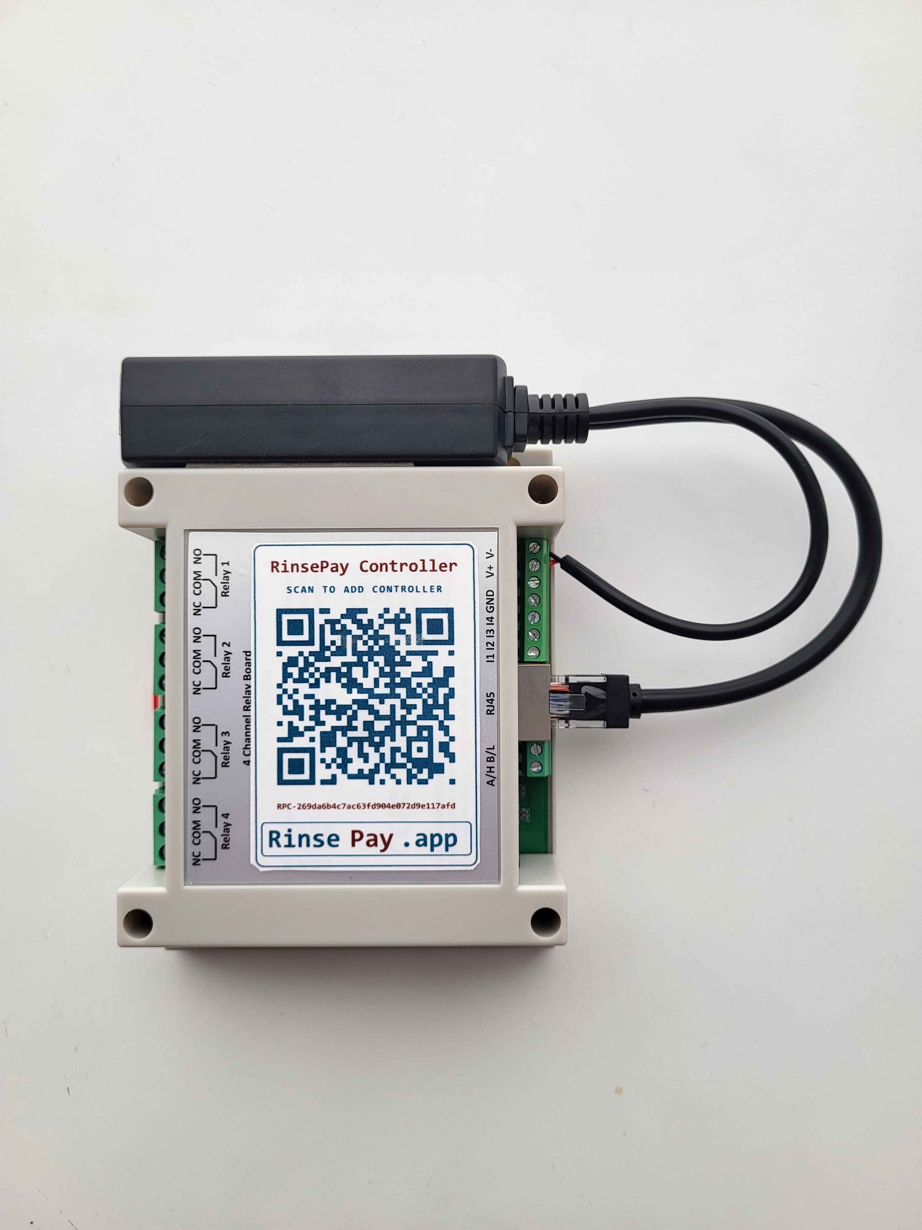 Rinsepay Controller — 4-channel relay board with QR label in white DIN enclosure.